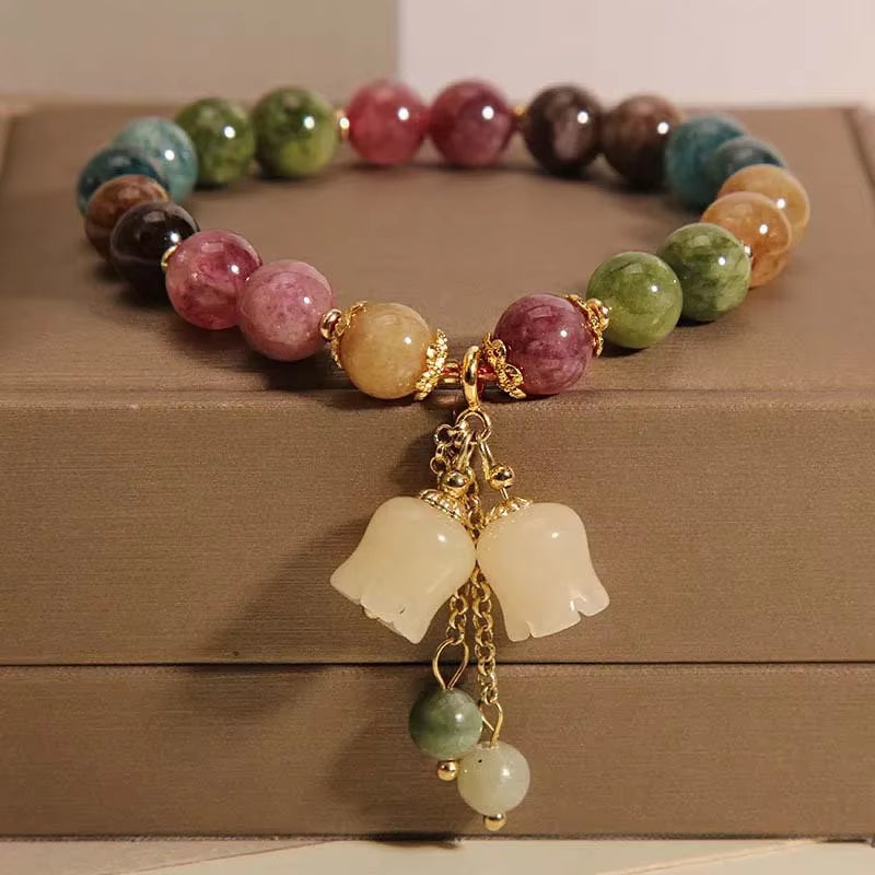 gold and silver chain bracelets